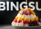Bingsu coreano con ghiaccio tritato soffice e topping dolci servito in una ciotola