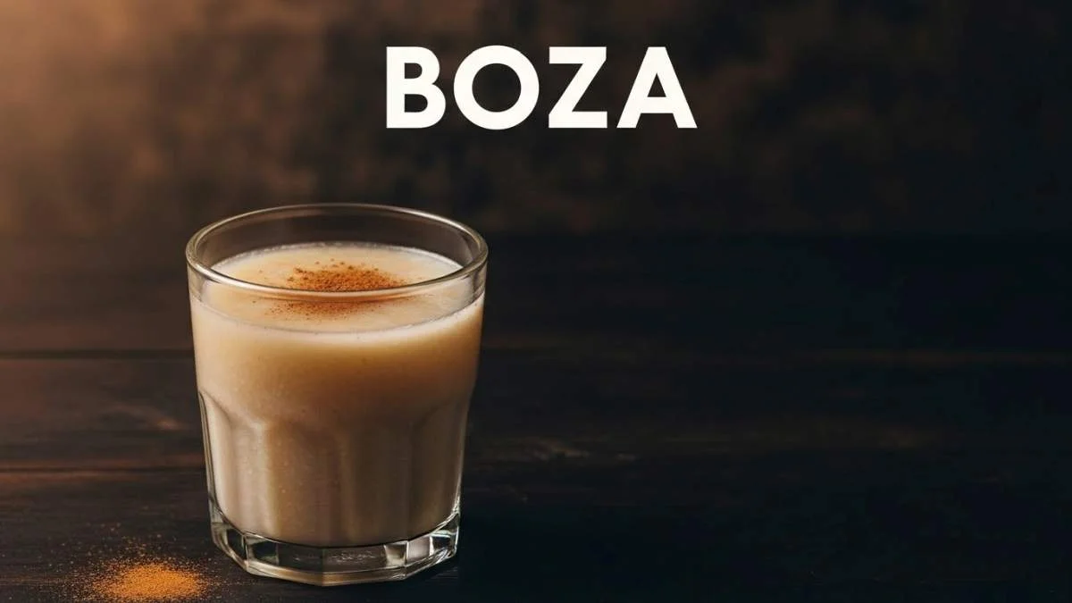 Boza tradizionale servita in un bicchiere con cannella e ceci tostati