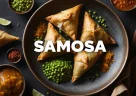 Samosa croccanti ripiene di patate speziate servite con salsa chutney, simbolo della cucina indiana e della diaspora globale
