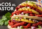 Tacos al pastor messicani: carne di maiale marinata all'achiote, ananas grigliato e cipolla fresca su tortilla di mais