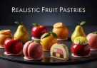 Pasticcini gourmet a forma di frutta realistica ricoperti da glassa lucida