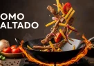 Lomo saltado peruviano con manzo saltato, cipolle e patatine fritte