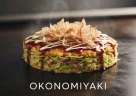 Okonomiyaki: Storia di un Piatto Nato dalla Necessità